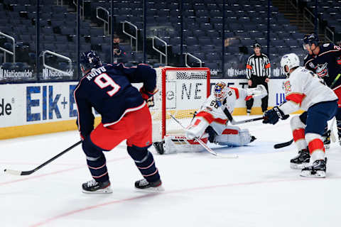 Jan 28, 2021; Columbus, Ohio, USA; Columbus Blue Jackets center Mikko Koivu (9) scores a goal against Florida Panthers goaltender Chris Driedger (60) in the first period at Nationwide Arena. Mandatory Credit: Aaron Doster-USA TODAY Sports