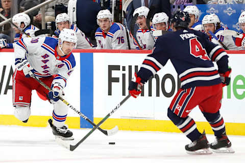 New York Rangers, Chris Kreider (20); Winnipeg Jets, Neal Pionk (4). Mandatory Credit: James Carey Lauder-USA TODAY Sports