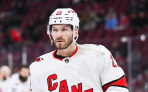 Apr 1, 2023; Montreal, Quebec, CAN; Carolina Hurricanes defenseman Brett Pesce (22) looks on during warm-up before the game against the Montreal Canadiens at Bell Centre. Mandatory Credit: David Kirouac-USA TODAY Sports