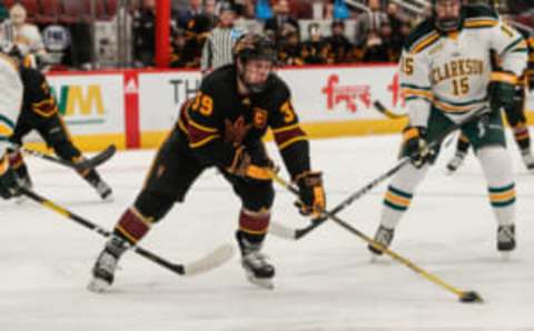 GLENDALE, AZ – DECEMBER 28: Arizona State Sun Devils defenseman Brinson Pasichnuk (39) controls the puck during the college hockey game between the Clarkson Golden Knights and the ASU Sun Devils on December 28, 2018 at Gila River Arena in Glendale, Arizona. (Photo by Kevin Abele/Icon Sportswire via Getty Images)