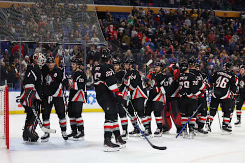 Dec 29, 2022; Buffalo, New York, USA; The Buffalo Sabres celebrate a win over the Detroit Red Wings at KeyBank Center. Mandatory Credit: Timothy T. Ludwig-USA TODAY Sports