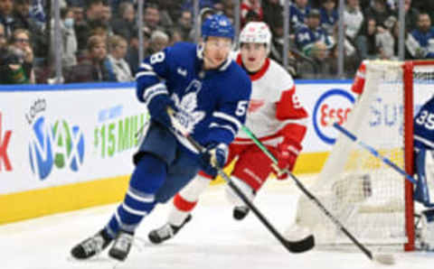 Apr 2, 2023; Toronto, Ontario, CAN; Toronto Maple Leafs forward Michael Bunting (58) pursues the play ahead of Detroit Red Wings forward Marco Kasper (92) in the first period at Scotiabank Arena. Mandatory Credit: Dan Hamilton-USA TODAY Sports