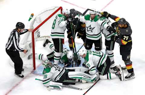 EDMONTON, ALBERTA – SEPTEMBER 14: Anton Khudobin #35 of the Dallas Stars covers up the puck against the Vegas Golden Knights during the second period in Game Five of the Western Conference Final during the 2020 NHL Stanley Cup Playoffs at Rogers Place on September 14, 2020 in Edmonton, Alberta, Canada. (Photo by Bruce Bennett/Getty Images)