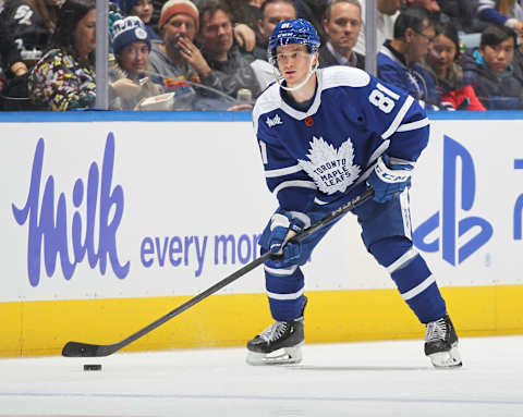 TORONTO, CANADA – NOVEMBER 30: Mac Hollowell #81 of the Toronto Maple Leafs handles  (Photo by Claus Andersen/Getty Images)