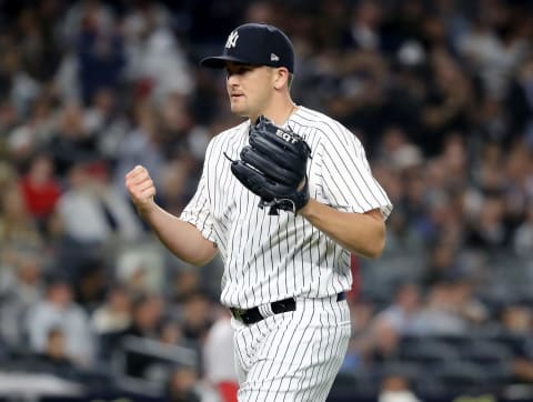 NEW YORK, NY – MAY 09: Jonathan Holder #56 of the New York Yankees reacts to the final out of the eighth inning against the Boston Red Sox at Yankee Stadium on May 9, 2018, in the Bronx borough of New York City. (Photo by Elsa/Getty Images)