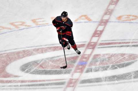 RALEIGH, NORTH CAROLINA – MAY 14: Warren Foegele #13 of the Carolina Hurricanes warms up prior to Game Three against the Boston Bruins in the Eastern Conference Finals during the 2019 NHL Stanley Cup Playoffs at PNC Arena on May 14, 2019 in Raleigh, North Carolina. (Photo by Grant Halverson/Getty Images)