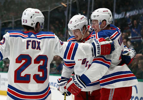 Kaapo Kakko #24 of the New York Rangers celebrates his goal with Adam Fox #23 and Brett Howden #21 (Photo by Ronald Martinez/Getty Images)