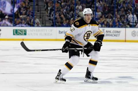 Apr 11, 2015; Tampa, FL, USA; Boston Bruins defenseman Zach Trotman (62) against the Tampa Bay Lightning during the first period at Amalie Arena. Mandatory Credit: Kim Klement-USA TODAY Sports