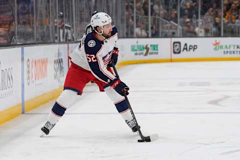 Apr 2, 2022; Boston, Massachusetts, USA; Columbus Blue Jackets center Emil Bemstrom (52) controls the puck against the Boston Bruins during the second period at TD Garden. Mandatory Credit: Gregory Fisher-USA TODAY Sports