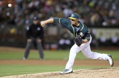 Jun 29, 2016; Oakland, CA, USA; Oakland Athletics relief pitcher Ryan Dull (66) delivers a pitch during the ninth inning against the San Francisco Giants at the Coliseum the Oakland Athletics defeated the San Francisco Giants 7 to 1. Mandatory Credit: Neville E. Guard-USA TODAY Sports