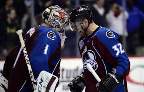 Jan 22, 2016; Denver, CO, USA; Colorado Avalanche goalie Semyon Varlamov (1) and defenseman Francois Beauchemin (32) celebrate shootout win over the St. Louis Blues at Pepsi Center. The Avalanche defeated the Blues 2-1 in a shootout. Mandatory Credit: Ron Chenoy-USA TODAY Sports