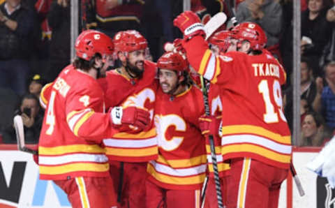 Mar 10, 2022; Calgary, Alberta, CAN; Calgary Flames forward Johnny Gaudreau (13) celebrates his third goal of the game against the Tampa Bay Lightning during the third period at Scotiabank Saddledome. Flames won 4-1. Mandatory Credit: Candice Ward-USA TODAY Sports