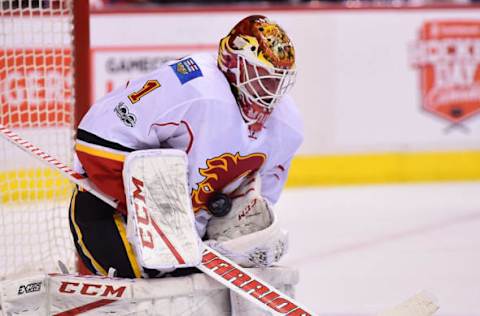 Feb 18, 2017; Vancouver, British Columbia, CAN; Calgary Flames goaltender Brian Elliott (1) makes a save against the Vancouver Canucks during the first period at Rogers Arena. Mandatory Credit: Anne-Marie Sorvin-USA TODAY Sports