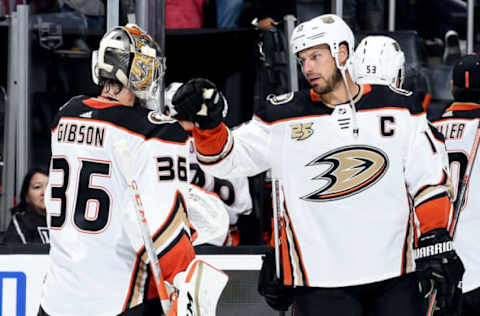 LOS ANGELES, CA – SEPTEMBER 29: Goaltender John Gibson #36 and Ryan Getzlaf #15 of the Anaheim Ducks fist bumping after defeating the Los Angeles Kings 3-0 in the preseason game at Staples Center on September 29, 2018, in Los Angeles, California. (Photo by Juan Ocampo/NHLI via Getty Images)