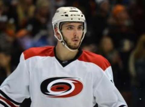 Dec 11, 2015; Anaheim, CA, USA; Carolina Hurricanes left wing Phil Di Giuseppe (34) reacts during an NHL hockey game against the Anaheim Ducks at the Honda Center. Mandatory Credit: Kirby Lee-USA TODAY Sports