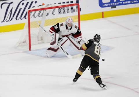 LAS VEGAS, NV – NOVEMBER 29: Vegas Golden Knights center Jonathan Marchessault (81) shoots the puck during a regular season game against the Arizona Coyotes Friday, Nov. 29, 2019, at T-Mobile Arena in Las Vegas, Nevada. (Photo by: Marc Sanchez/Icon Sportswire via Getty Images)