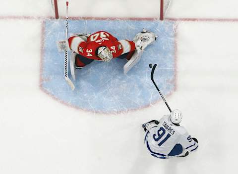 John Tavares #91 of the Toronto Maple Leafs scores the game winning goal in overtime past goaltender Alex Lyon #34 of the Florida Panthers at the FLA Live Arena on April 10, 2023 in Sunrise, Florida. (Photo by Joel Auerbach/Getty Images)