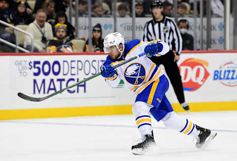 PITTSBURGH, PENNSYLVANIA – DECEMBER 17: Casey Fitzgerald #45 of the Buffalo Sabres takes a shot during the second period of a game against the Pittsburgh Penguins at PPG PAINTS Arena on December 17, 2021 in Pittsburgh, Pennsylvania. (Photo by Emilee Chinn/Getty Images)