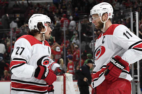 CHICAGO, IL – MARCH 08: Justin Faulk #27 and Jordan Staal #11 of the Carolina Hurricanes talk in the first period against the Chicago Blackhawks at the United Center on March 8, 2018 in Chicago, Illinois. (Photo by Bill Smith/NHLI via Getty Images)