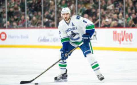 Mar 25, 2017; Saint Paul, MN, USA; Vancouver Canucks defenseman Chris Tanev (8) against the Minnesota Wild at Xcel Energy Center. The Canucks defeated the Wild 4-2. Mandatory Credit: Brace Hemmelgarn-USA TODAY Sports