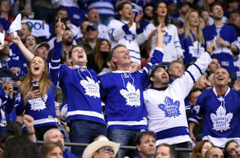 Apr 17, 2017; Toronto, Ontario, CAN; Toronto Maple Leafs fans celebrate as their team defeats Washington Capitals 4-3 in overtime in game three of the first round of the 2017 Stanley Cup Playoffs at Air Canada Centre. Mandatory Credit: Dan Hamilton-USA TODAY Sports