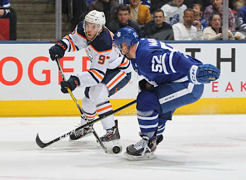 TORONTO, ON – JANUARY 06: Connor McDavid #97 of the Edmonton Oilers fires a shot against Martin Marincin #52 of the Toronto Maple Leafs during an NHL game at Scotiabank Arena on January 6, 2020 in Toronto, Ontario, Canada. (Photo by Claus Andersen/Getty Images)