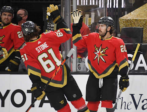 LAS VEGAS, NEVADA – APRIL 09: Mark Stone #61 and Chandler Stephenson #20 of the Vegas Golden Knights high-five after Stone assisted Stephenson on a second-period goal the Arizona Coyotes during their game at T-Mobile Arena on April 9, 2021 in Las Vegas, Nevada. (Photo by Ethan Miller/Getty Images)