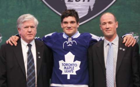 ST PAUL, MN – JUNE 24: 22nd overall pick Tyler Biggs by the Toronto Maple Leafs  . (Photo by Bruce Bennett/Getty Images)