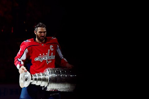 WASHINGTON, DC – OCTOBER 03: Alex Ovechkin #8 of the Washington Capitals skates with the Stanley Cup prior to watching the 2018 Stanley Cup Championship banner rise to the rafters before playing against the Boston Bruins at Capital One Arena on October 3, 2018 in Washington, DC. (Photo by Patrick McDermott/NHLI via Getty Images)