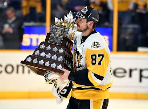 Jun 11, 2017; Nashville, TN, USA; Pittsburgh Penguins center Sidney Crosby (87) is presented with the Conn Smythe Trophy after defeating the Nashville Predators in game six of the 2017 Stanley Cup Final at Bridgestone Arena. Mandatory Credit: Christopher Hanewinckel-USA TODAY Sports