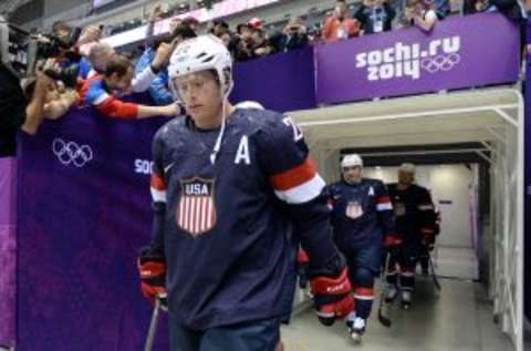 Feb 15, 2014; Sochi, RUSSIA; USA defenseman Ryan Suter (20) leads his teammates to the ice before a men’s preliminary round ice hockey game against Russia during the Sochi 2014 Olympic Winter Games at Bolshoy Ice Dome. Mandatory Credit: Jayne Kamin-Oncea-USA TODAY Sports