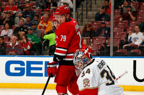 SUNRISE, FL – FEBRUARY 21: Goaltender James Reimer #34 of the Florida Panthers defends the net against Micheal Ferland #79 of the Carolina Hurricanes at the BB&T Center on February 21, 2019 in Sunrise, Florida. (Photo by Eliot J. Schechter/NHLI via Getty Images)