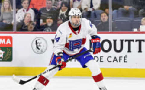 LAVAL, QC – DECEMBER 22: Noah Juulsen Josh Laval Rocket (Photo by Minas Panagiotakis/Getty Images)