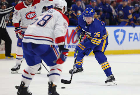 Mar 27, 2023; Buffalo, New York, USA; Buffalo Sabres defenseman Rasmus Dahlin (26) carries the puck up ice during the second period against the Montreal Canadiens at KeyBank Center. Mandatory Credit: Timothy T. Ludwig-USA TODAY Sports