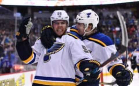 Mar 21, 2017; Denver, CO, USA; St. Louis Blues left-wing Magnus Paajarvi (56) celebrates his goal ahead goal with center Ivan Barbashev (49) in the third period against the Colorado Avalanche at the Pepsi Center. The Blues defeated the Avalanche 4-2. (Ron Chenoy-USA TODAY Sports)