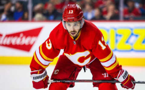 Apr 2, 2022; Calgary, Alberta, CAN; Calgary Flames left wing Johnny Gaudreau (13) during the face off against the St. Louis Blues during the third period at Scotiabank Saddledome. Mandatory Credit: Sergei Belski-USA TODAY Sports