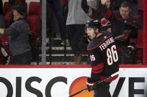 RALEIGH, NC – APRIL 18: Teuvo Tervainen #86 of the Carolina Hurricanes celebrates after scoring a goal in Game Four of the Eastern Conference First Round against the Washington Capitals during the 2019 NHL Stanley Cup Playoffs on April 18, 2019 at PNC Arena in Raleigh, North Carolina. (Photo by Gregg Forwerck/NHLI via Getty Images)