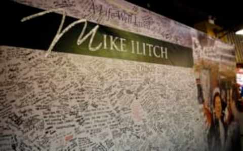 Feb 15, 2017; Detroit, MI, USA; A card for Detroit Red Wings owner Mike Ilitch is on display prior to the game between the Detroit Red Wings and the St. Louis Blues at Joe Louis Arena. Mike Ilitch passed away February 10, 2017. Mandatory Credit: Rick Osentoski-USA TODAY Sports