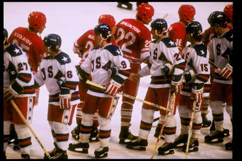 22 Feb 1980: General view of teams from the United States and the Soviet Union shaking hands after the semifinal hockey game during the Winter Olympics in Lake Placid, New York. The United States won the game 4-3. The game was dubbed The Miracle On Ice.