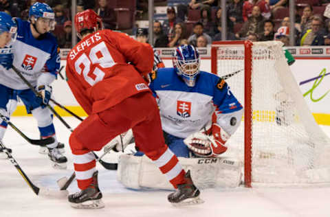 VANCOUVER, BC – JANUARY 2: Goalie Samuel Hlavaj #2 of Slovakia stops Kirill Slepets #29 of Russia in close in Quarterfinal hockey action of the 2019 IIHF World Junior Championship on January, 2, 2019 at Rogers Arena in Vancouver, British Columbia, Canada. (Photo by Rich Lam/Getty Images)