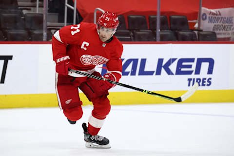 DETROIT, MICHIGAN – MARCH 28: Dylan Larkin #71 of the Detroit Red Wings skates against the Columbus Blue Jackets at Little Caesars Arena on March 28, 2021 in Detroit, Michigan. (Photo by Gregory Shamus/Getty Images)