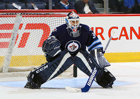 WINNIPEG, MB – NOVEMBER 8: Goaltender Michael Hutchinson #34 of the Winnipeg Jets takes part in the pre-game warm up prior to NHL action against the Dallas Stars at the MTS Centre on November 8, 2016 in Winnipeg, Manitoba, Canada. (Photo by Jonathan Kozub/NHLI via Getty Images)