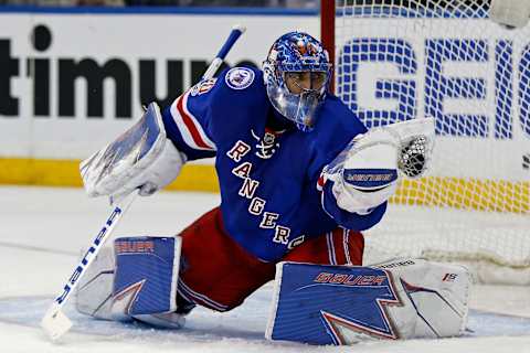 Feb 19, 2017; New York, NY, USA; New York Rangers goalie Henrik Lundqvist (30) makes a save during the third period against the Washington Capitals at Madison Square Garden. Mandatory Credit: Adam Hunger-USA TODAY Sports