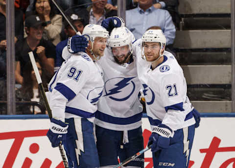 TORONTO, ON – OCTOBER 10: Nikita Kucherov #86 of the Tampa Bay Lightning celebrates his goal against the Toronto Maple Leafs with teammates Steven Stamkos #91 and Brayden Point #21 during the third at the Scotiabank Arena on October 10, 2019 in Toronto, Ontario, Canada. (Photo by Mark Blinch/NHLI via Getty Images)