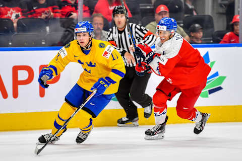 EDMONTON, AB – AUGUST 20: Fabian Lysell #11 of Sweden and Jiri Tichacek #4 of Czechia follow the play up the ice during the 2022 IIHF World Junior Championship bronze medal game at Rogers Place on August 20, 2022 in Edmonton, Alberta, Canada. (Photo by Andy Devlin/Getty Images)