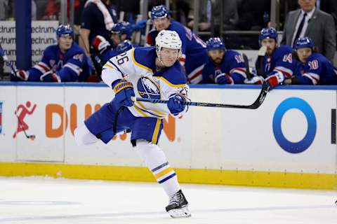 Apr 10, 2023; New York, New York, USA; Buffalo Sabres defenseman Rasmus Dahlin (26) follows through on a pass against the New York Rangers during the first period at Madison Square Garden. Mandatory Credit: Brad Penner-USA TODAY Sports