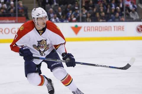 Apr 4, 2016; Toronto, Ontario, CAN; Florida Panthers defenseman Dmitry Kulikov (7) skates against the Toronto Maple Leafs at the Air Canada Centre. Florida defeated Toronto 4-3. Mandatory Credit: John E. Sokolowski-USA TODAY Sports