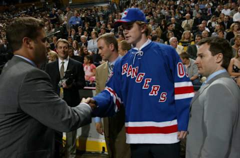 NASHVILLE, TN – JUNE 21: Hugh Jessiman of the New York Rangers is introduced to his new team during the 2003 NHL Entry Draft at the Gaylord Entertainment Center on June 21, 2003 in Nashville, Tennessee. (Photo by Doug Pensinger/Getty Images/NHLI)