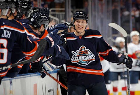 Canucks prospect Aatu Raty celebrates his first NHL goal with the Islanders. (Photo by Bruce Bennett/Getty Images)