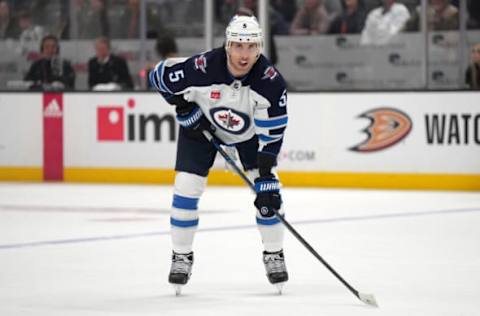 Mar 23, 2023; Anaheim, California, USA; Winnipeg Jets defenseman Brenden Dillon (5) against the Anaheim Ducks in the third period at Honda Center. Mandatory Credit: Kirby Lee-USA TODAY Sports